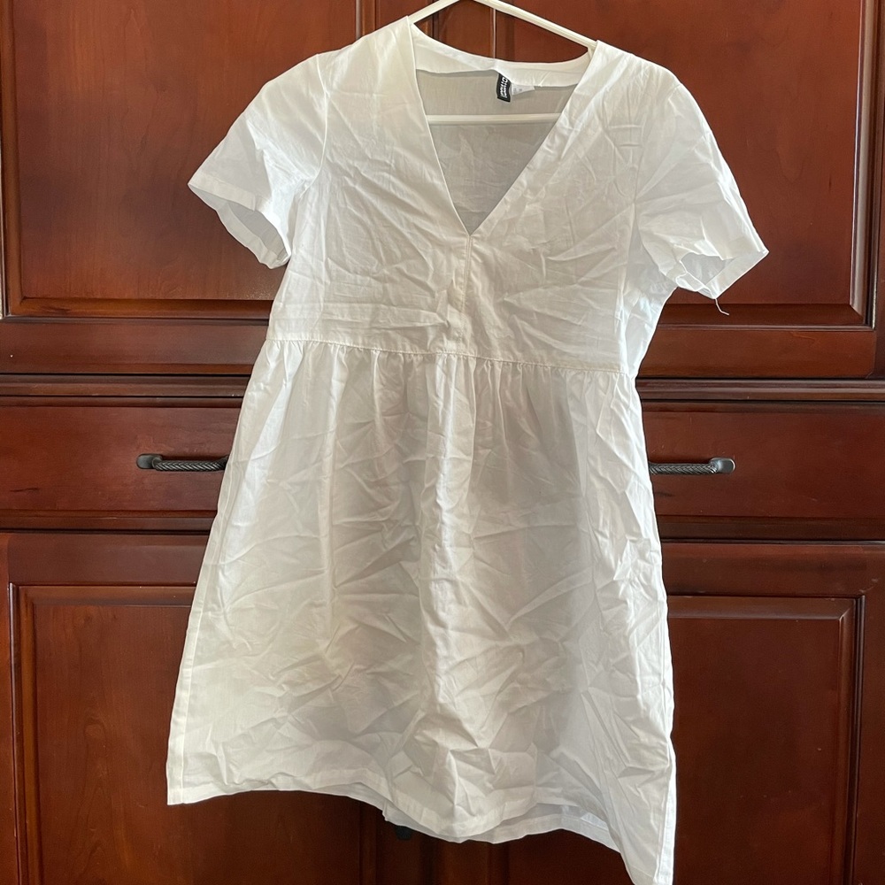 white shift dress (or swimsuit cover up)